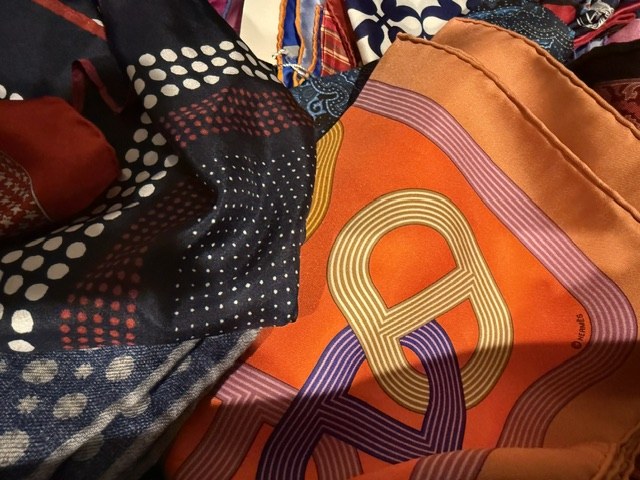 A stack of silk pocket squares