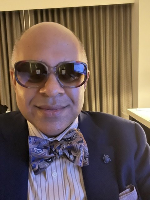 Sri Ramaswami personal style, blue paisley bow tie